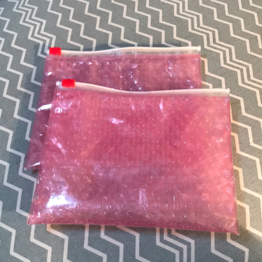 Two brand new Glossier bags